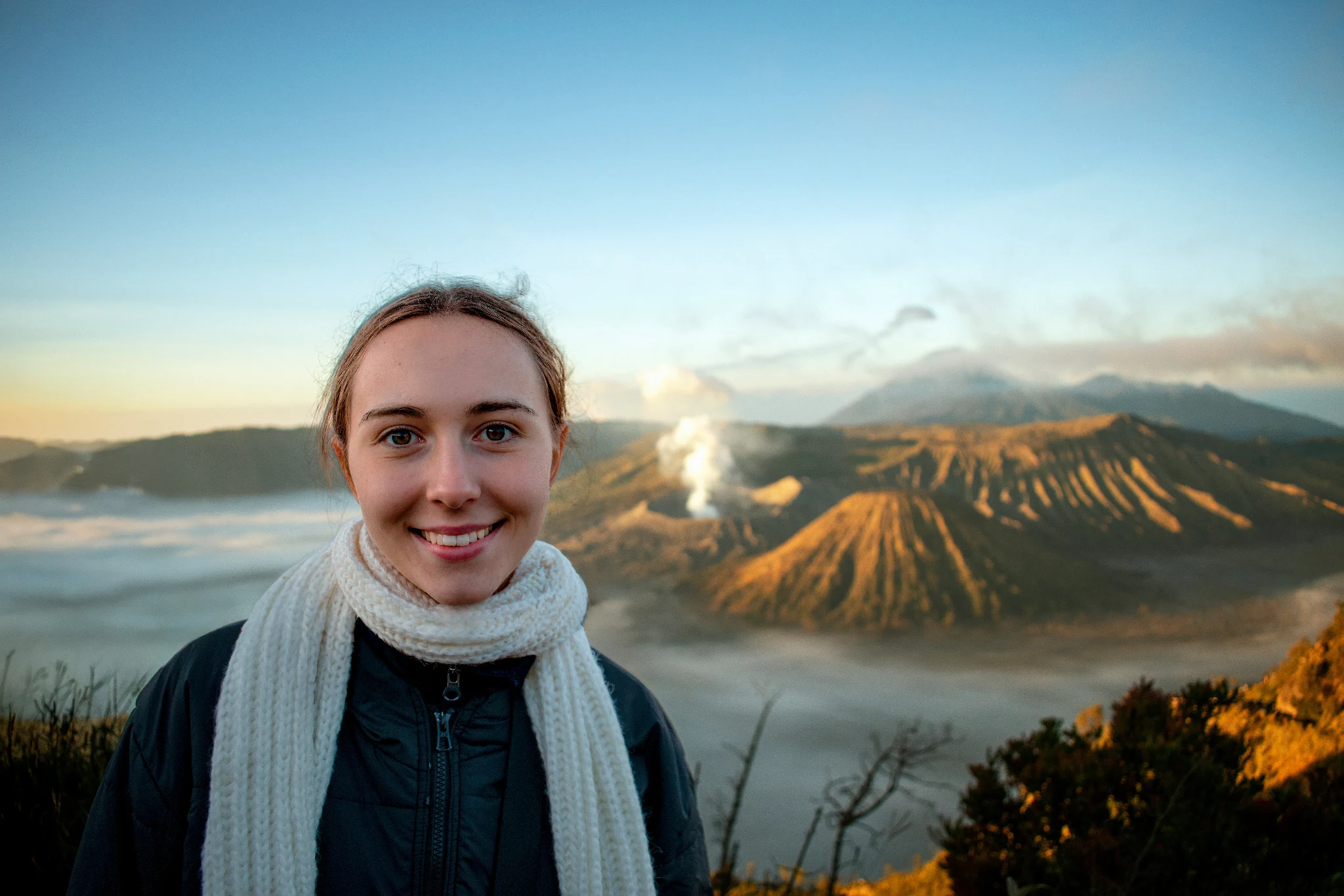 Portrait overlooking a volcanic landscape